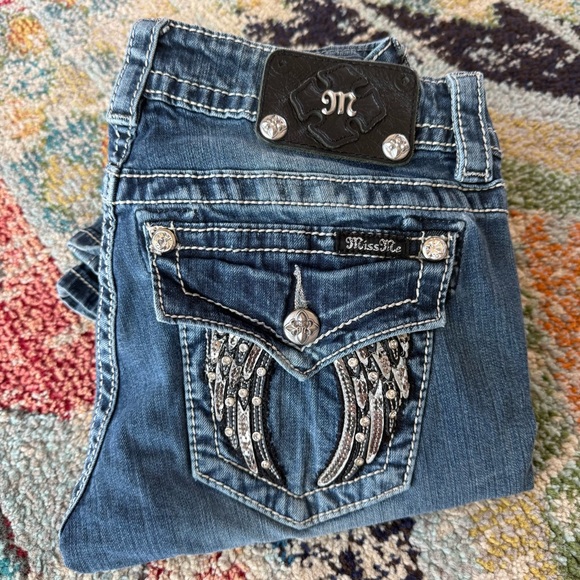 Miss Me Denim - Miss Me Angel Wing Rhinestone Flap Pocket Bootcut Jeans